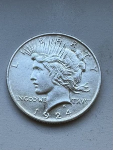 1924 Peace Silver Dollar - INV#7679 - Picture 1 of 2