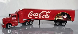 LKW Modell Coca Cola Werbetruck Sattelzug Rot 1:87 Weihnachtsmann füllt Strumpf - Bild 1 von 7