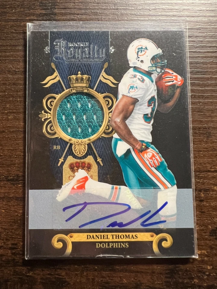 A93,888 - 2011 Crown Royale Rookie Royalty Jersey Auto #23 Daniel Thomas/100 - Image 1 of 1