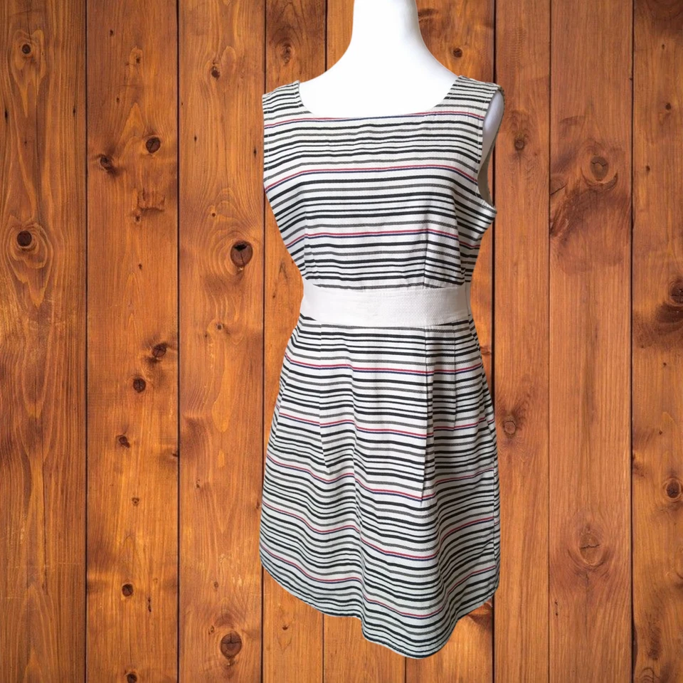 Vestido para mujer marca de tul a rayas medianas sin mangas hasta la rodilla moño acento espalda Foto 1 de 4