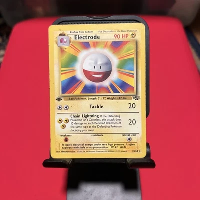 Electrode 18/64 Jungle - First Edition - Error Card Pokémon - Image 1 of 4