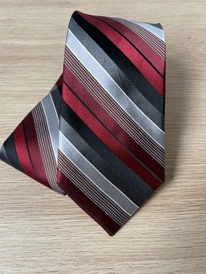 Corbata Michael by Michael Kors diseño a rayas negras, rojas, grises 100 % seda Foto 1 de 4