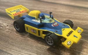 Vintage AURORA AFX TIGER S.SOLO G-PLUS F-1 H.O. COCHE TRAGAMONEDAS impresionante estado - Imagen 1 de 24