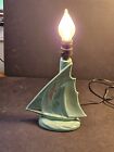 MCM green ceramic sailboat lamp. works but wire not through hole/9x12