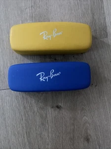 2 Stück Ray-Ban Sonnenbrillen Etui blau+gelb Hartschale rot Filz gefüttert Neu - Bild 1 von 6