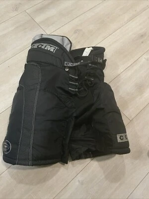 Pantalones de hockey CCM NHL 692 Tacks 24” cintura junior pequeños Foto 1 de 4