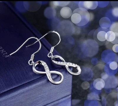 Brincos hipoalergênicos infinitos de prata esterlina com safira branca - Imagem 1 de 3