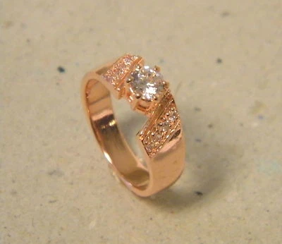 Alianza de boda para mujer enchapada en oro rosa anillo de moda 9 circonitas talla 7 Foto 1 de 4