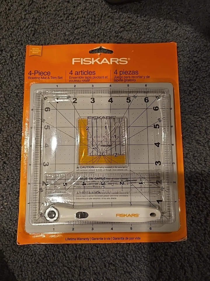 JUEGO DE 4 ALFOMBRILLAS Y MOLDURAS GIRATORIAS FISKARS Foto 1 de 1