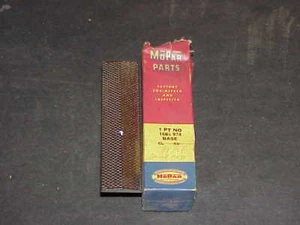 1957 Plymouth Fury NOS MoPar Grill EMBLEM BASE Belvedere Plaza Savoy Suburban - Picture 1 of 1