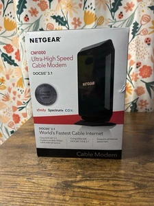 NETGEAR CM1000 DOCSIS 1000Mbps Cable Modem (CM1000-1AZNAS) - Picture 1 of 8