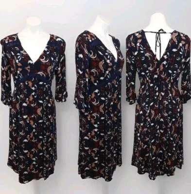 Vestido midi Velzera manga 3/4 cuello en V espalda en V bohemio informal estampado floral mediano Foto 1 de 4