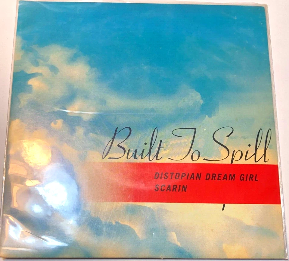 Built To Spill 7" 45 Record  & Picture Sleeve Distopian Dream Girl / Scarin - Image 1 of 4