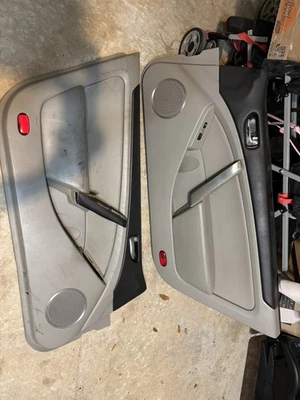 03 04 INFINITI G35 Front Left+Right Door Trim Panel Pair Set Tan - Image 1 of 3