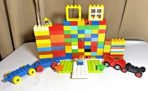 Lego Duplo Bausteine Konvolut 100 Bausteine 2 Züge 2 Autos 1 Figur 2 Fenster 2 Blumen - Bild 1 von 4