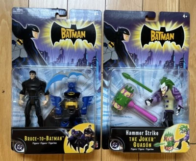 Lote de 2 figuras de Batman Bruce-To-Batman y Hammer Strike Joker Mattel Kids WB Foto 1 de 4