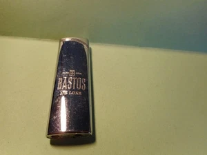 BRIQUET BASTOS LIGHTER Feuerz 打火机 ACCENDINO AANSTEKER léttari ljusare ENCENDEDOR - Bild 1 von 3