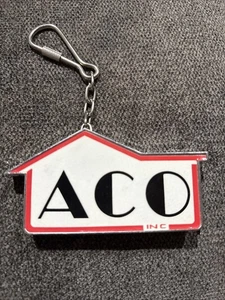 Portachiavi Vintage Aco Hardware Michigan Miglioramento Casa Fornitura Negozio Misura Nastro - Foto 1 di 7