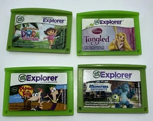 Lot 4 Leapfrog Explorer Learning Cartridges Dora Tangled Monsters U Phineas Ferb - Picture 1 of 2