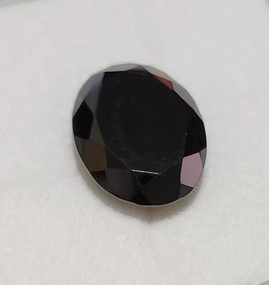 Black Spinel Oval GEMSTONE- 20x15 MM - 17.6CTS - Image 1 of 3