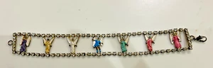 "Pulsera vintage esmaltada ángeles y pedrería tono plata 7,5"" años 80 rara" - Imagen 1 de 14