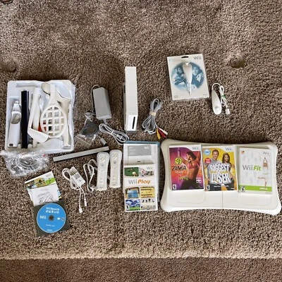 Wii Gaming System Bundle Wii Sports, Balance Board Games Nunchucks Remotes - Image 1 of 4