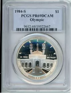 1984S LOS ANGELES OLYMPICS COMMEMORATIVE DOLLAR PCGS PR69DCAM Cert. 19522667 - Picture 1 of 2