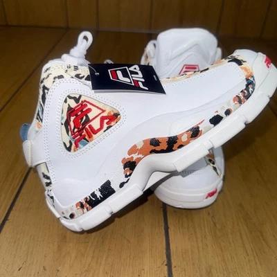 Zapatillas altas deportivas de cuero blancas Fila para mujer con ribete de leopardo ropa de calle Foto 1 de 4