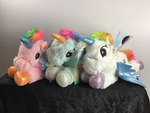 Einhorn Plüschtier Plüschfigur weiß rosa hellblau liegend GlitzerLeuchtfunktion - Bild 1 von 12