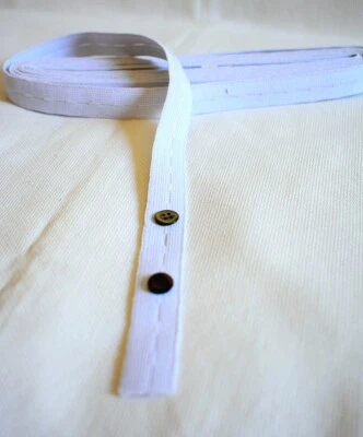 1 M DI NASTRO BI ELASTICO CON ASOLE PER BOTTONI ALTEZZA 18mm ⬜️ - Immagine 1 di 4