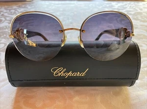 Gafas de sol Chopard para mujer SCHB67S negro dorado redondo cristal degradado - Imagen 1 de 9