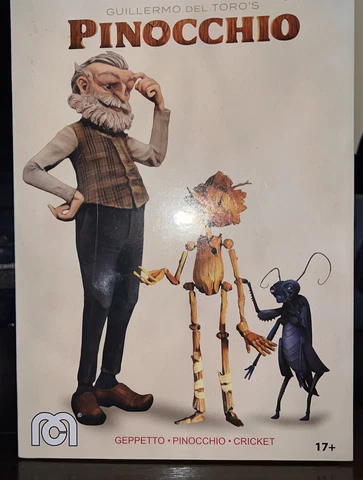 Guillermo Del Toro's Pinocchio Mego (PINOCCHIO, GEPPETTO, CRICKET) Figures Cover