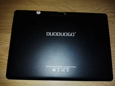 DUODUOGO 10.1" TABLET. COMES ON BUT HAS A CHINESE WARNING ON. SOLD AS SPARES. - Image 1 of 4