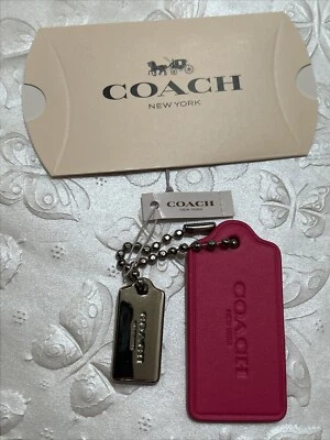 Nuevo con etiquetas colgantes Coach de cuero rosa y metal plateado juego de 2 piezas dijes FOB Foto 1 de 4