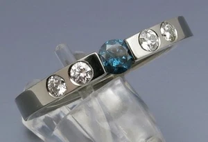 DISEÑO MADURO - ANILLO TENSOR BRILLANTE MODERNO 0,55 QUILATES - DE ORFEBRERÍA PROPIA - Imagen 1 de 3