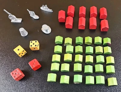 Piezas de reproductor de metal Monopoly vintage hoteles y dados de madera Foto 1 de 4