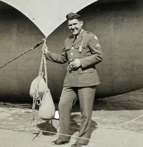 Vintage 1940s WWII Sepia Photograph American Army Soldier Posing Barrage Balloon - Picture 1 of 3