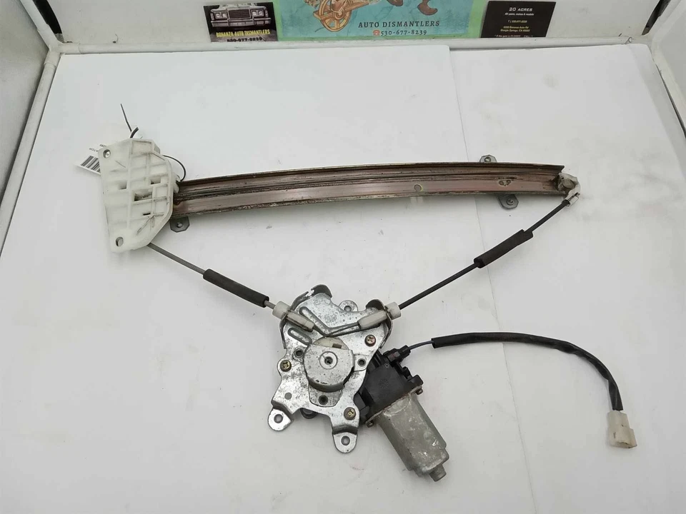 Regulador de ventana LH 97-02 MITSUBISHI Mirage DRIVERSIDE con motor USADO OEM Foto 1 de 4
