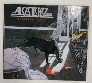 ALCATRAZZ - DANGEROUS GAMES - CD DIGIPAK 20 INC'S 9 BONUS TRACKS 2011 VGC RARE - Picture 1 of 4