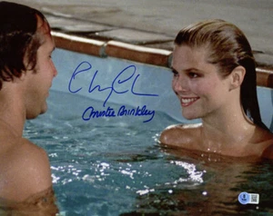 CHEVY CHASE CHRISTIE BRINKLEY DUAL SIGNED 11x14 FOTO URLAUB SELTEN BECKETT BAS - Bild 1 von 3