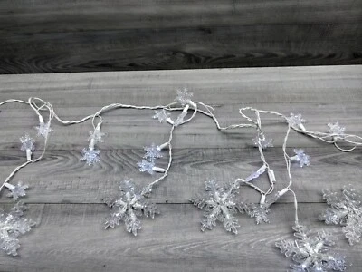 Snowflake incandescent String Lights. 6 Feet Long. Dangling Rows of Snowflakes.  - Image 1 of 4