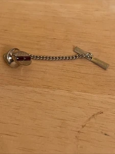 silver-tone tie tack with red stones and a securing chain - Picture 1 of 4