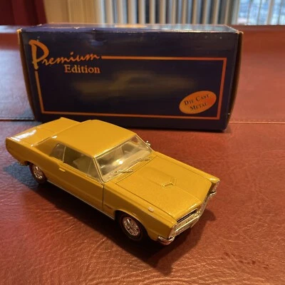 WELLY 1:26 1965 PONTIAC GTO AMERICAN MINT DIE CAST CAR W INSERT/BOX/CERTIFICATE - Image 1 of 4