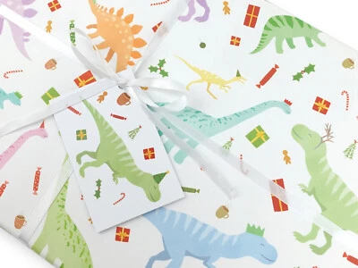 Christmas dinosaur gift wrapping paper | Quality gift wrap + tag | Recyclable - Image 1 of 4