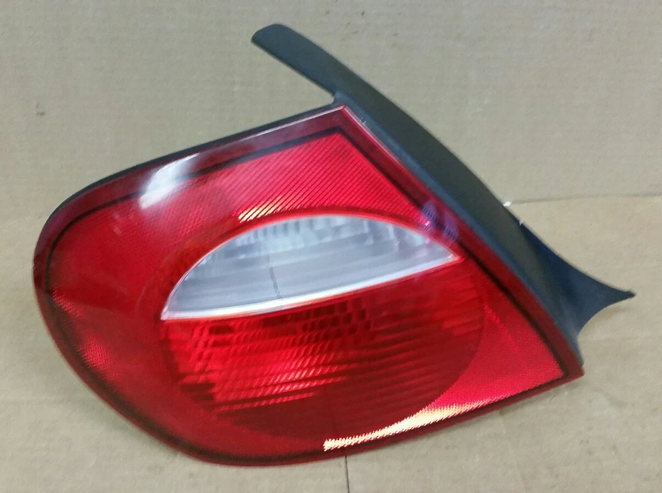 2003 2004 2005 DODGE NEON TAILLIGHT ASSEMBLY LEFT DRIVERS SIDE OEM USED - Image 1 of 1