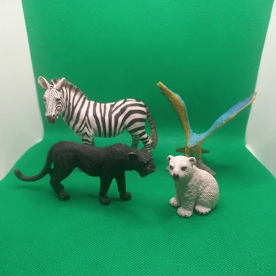 Schleich Macaw, polar cub, pantherand zebra - image 1 of 4