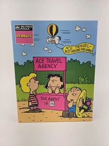 Vintage Peanuts 200 Piece Jigsaw Puzzle Ace Travel Agency  1980’s NIB - Picture 1 of 2