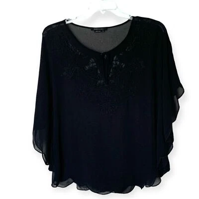 Blusa/top BCBGMaxAzria negra superpuesta transparente con detalle de encaje y borla talla mediana Foto 1 de 4