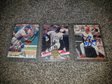 Ivan Rodriguez Juan Gonzalez Rusty Greer AUTOGRAPHED 1993 MVP baseball