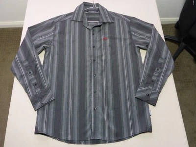 035 CAMISA HOMBRE NUEVA SIN ETIQUETAS CARBÓN OXIDADO/GRIS/ROJO RAYA L/S TALLA MEDIANA PRECIO DE VENTA SUGERIDO POR EL FABRICANTE 80 $ Foto 1 de 4